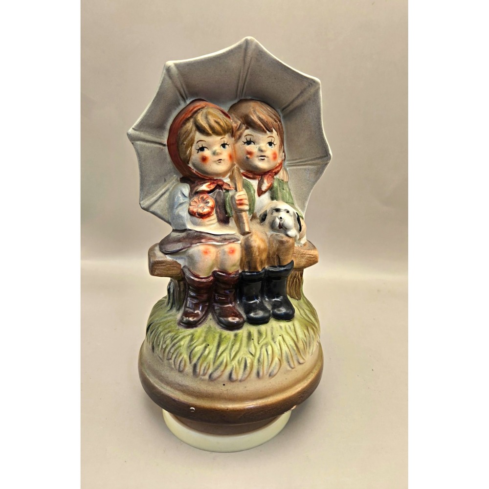 Vintage Porcelain Music Figurine 'Raindrops Keep Falling on my Head'  B#38